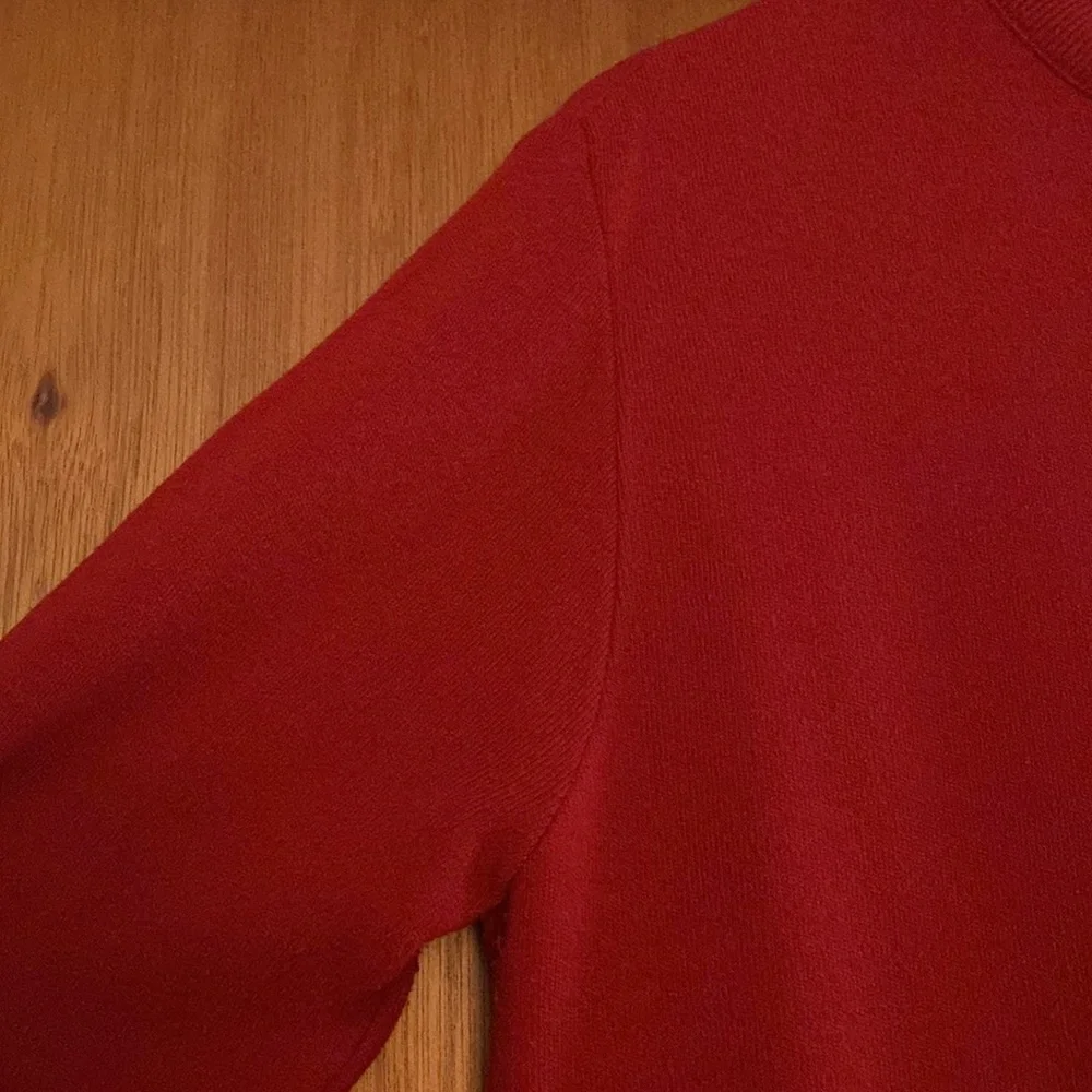 Classic used red sweater by Haymaker with zipper in the back size 42